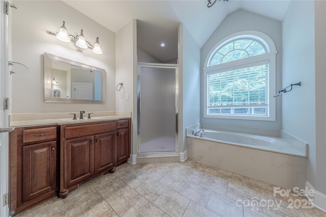 4113 Hoffmeister Dr, Waxhaw, NC 28173 - bathroom featuring lofted ceiling, vanity, a stall shower, and a bath