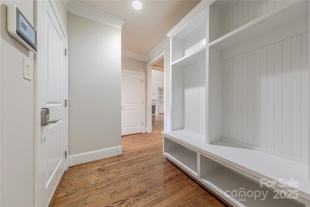 4113 Hoffmeister Dr, Waxhaw, NC 28173 - mudroom featuring crown molding, wood finished floors, and baseboards
