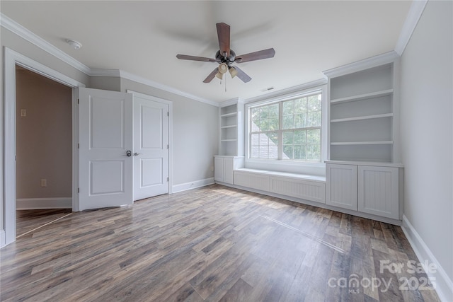4113 Hoffmeister Dr, Waxhaw, NC 28173 - unfurnished bedroom featuring wood finished floors, baseboards, ornamental molding, and ceiling fan