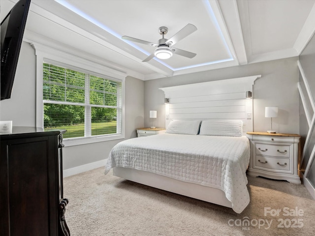 bedroom featuring carpet flooring, baseboards, and ceiling fan