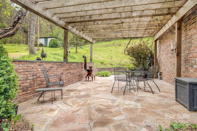 6334 Jacks Creek Rd, Burnsville, NC 28714 - view of patio featuring a pergola and outdoor dining area