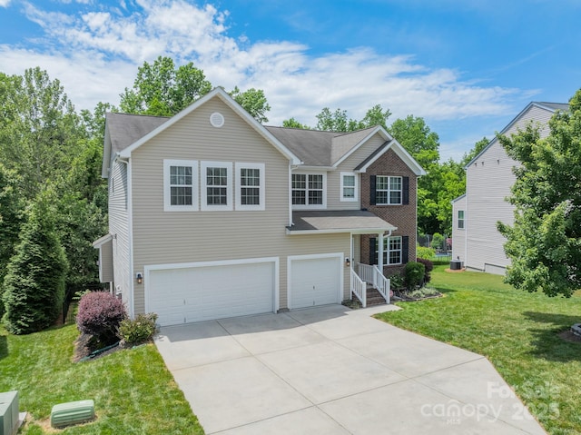 7650 W Berkeley Rd, Denver, NC 28037 - traditional-style home with an attached garage, driveway, and a front lawn