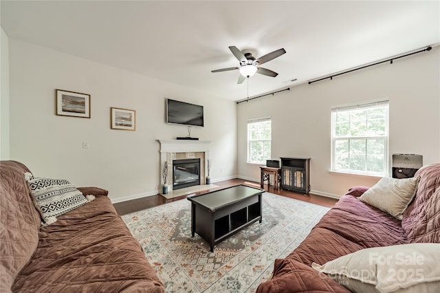 7650 W Berkeley Rd, Denver, NC 28037 - living room featuring a premium fireplace, a ceiling fan, and wood finished floors