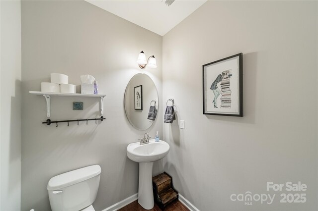 7650 W Berkeley Rd, Denver, NC 28037 - half bath with toilet and wood finished floors