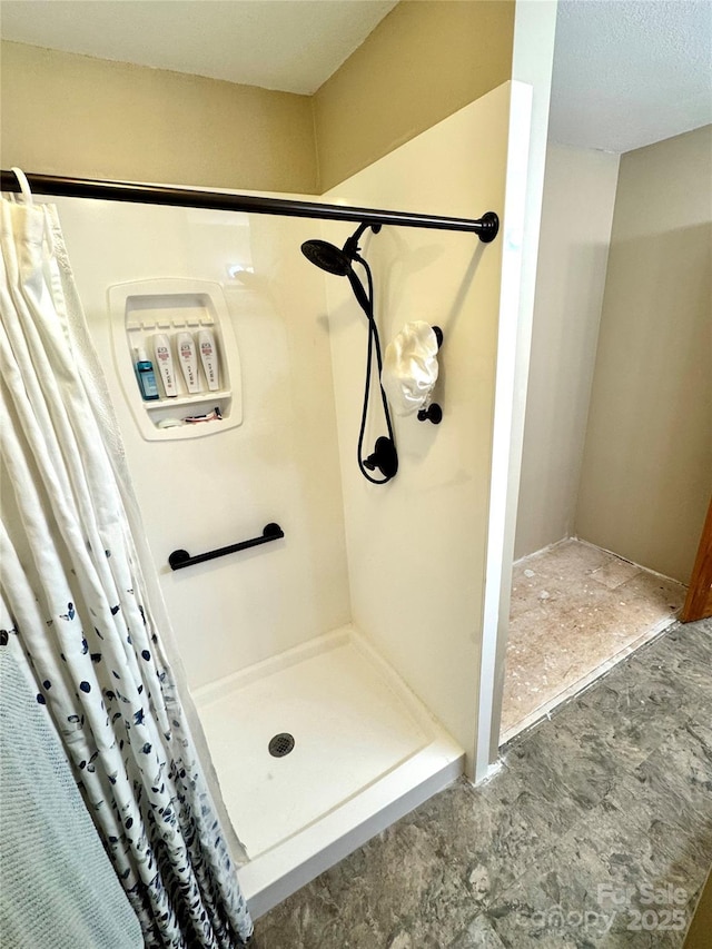 full bathroom featuring a stall shower