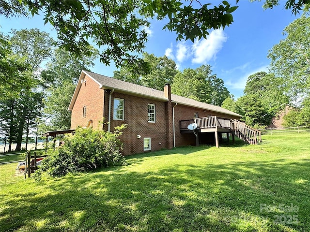 view of property exterior featuring brick siding, stairway, a wooden deck, and a chimney