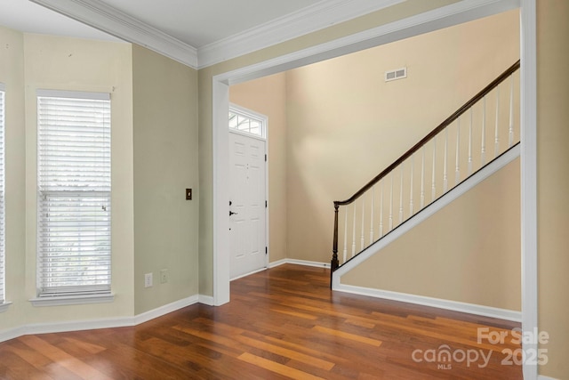 12824 Harvest Time Ct, Charlotte, NC 28278 - foyer entrance featuring wood finished floors, baseboards, stairway, and crown molding