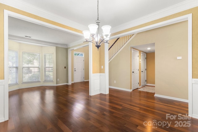 12824 Harvest Time Ct, Charlotte, NC 28278 - empty room featuring hardwood / wood-style floors, crown molding, a chandelier, baseboards, and a wainscoted wall