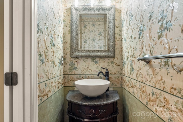 12824 Harvest Time Ct, Charlotte, NC 28278 - bathroom with wallpapered walls and vanity