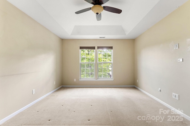 12824 Harvest Time Ct, Charlotte, NC 28278 - carpeted spare room with a raised ceiling, a ceiling fan, and baseboards