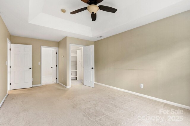 12824 Harvest Time Ct, Charlotte, NC 28278 - unfurnished bedroom featuring baseboards, carpet, and a spacious closet