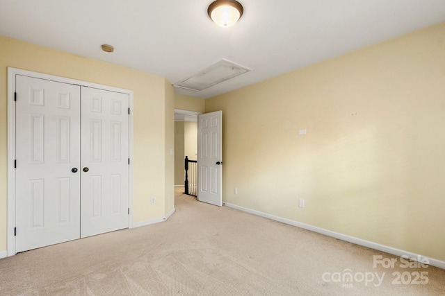 12824 Harvest Time Ct, Charlotte, NC 28278 - unfurnished bedroom featuring light colored carpet, baseboards, and a closet