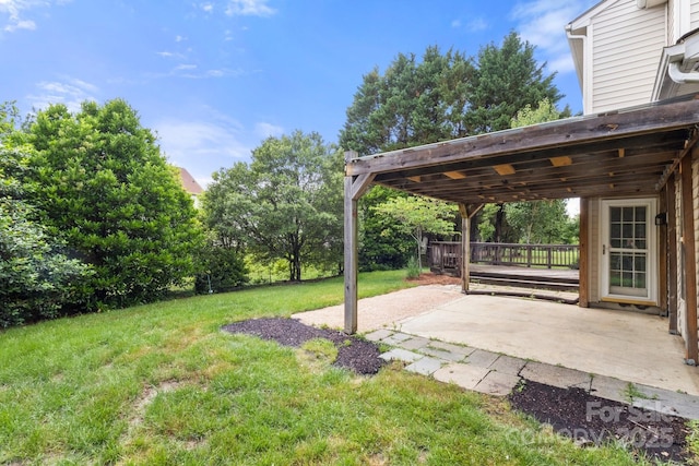 12824 Harvest Time Ct, Charlotte, NC 28278 - view of grassy yard featuring a patio area