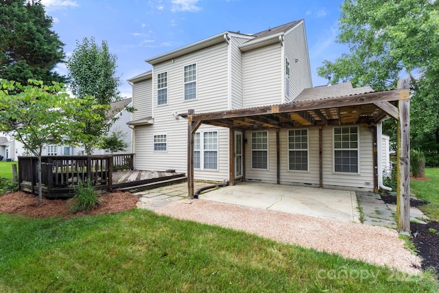 12824 Harvest Time Ct, Charlotte, NC 28278 - back of property featuring a wooden deck, a patio area, and a lawn