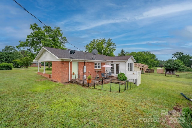 1761 Oak Grove Church Rd, Ellenboro, NC 28040 - back of property featuring a yard, french doors, brick siding, and a patio area