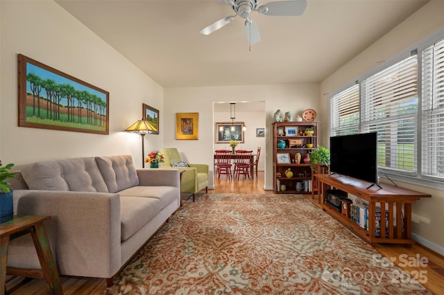 1761 Oak Grove Church Rd, Ellenboro, NC 28040 - living room featuring ceiling fan, wood finished floors, and baseboards