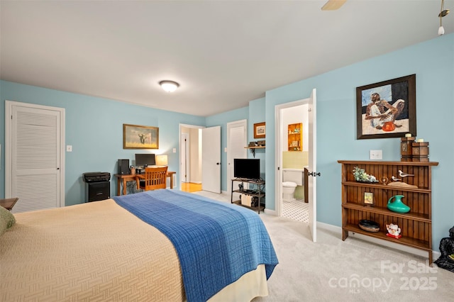 1761 Oak Grove Church Rd, Ellenboro, NC 28040 - bedroom with light colored carpet, ensuite bath, and baseboards