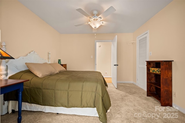 1761 Oak Grove Church Rd, Ellenboro, NC 28040 - carpeted bedroom with baseboards, a closet, and a ceiling fan