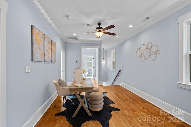 331 Solomon St, Charlotte, NC 28216 - dining room featuring wood finished floors, ornamental molding, baseboards, recessed lighting, and a ceiling fan