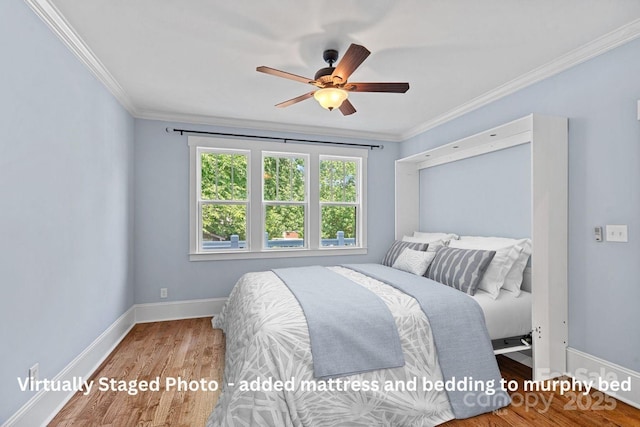 331 Solomon St, Charlotte, NC 28216 - bedroom featuring baseboards, wood finished floors, ornamental molding, and a ceiling fan