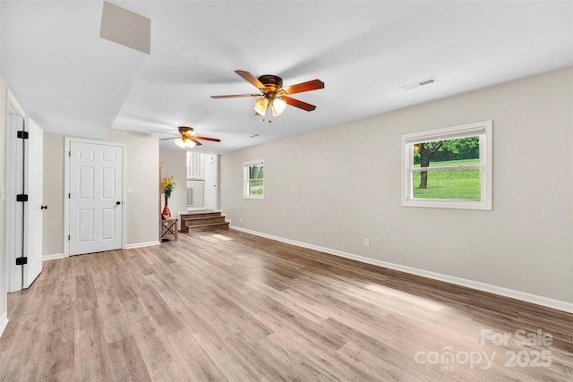 1822 N New Hope Rd, Gastonia, NC 28054 - unfurnished room featuring ceiling fan, light wood-style floors, and baseboards