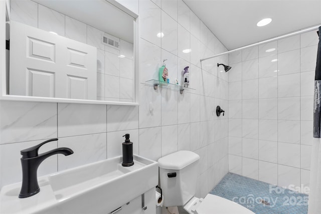 1822 N New Hope Rd, Gastonia, NC 28054 - full bath featuring a tile shower, toilet, tile walls, and vanity