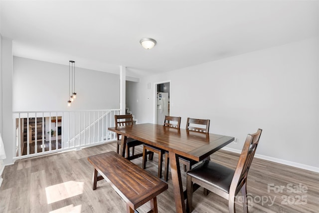 1822 N New Hope Rd, Gastonia, NC 28054 - dining room with wood finished floors and baseboards