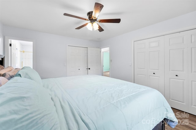 1822 N New Hope Rd, Gastonia, NC 28054 - bedroom with wood finished floors, multiple closets, and ceiling fan