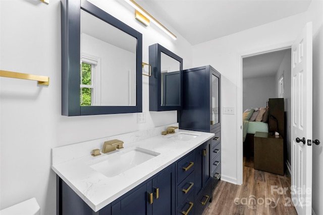 1822 N New Hope Rd, Gastonia, NC 28054 - bathroom with wood finished floors and double vanity