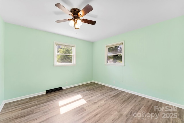 1822 N New Hope Rd, Gastonia, NC 28054 - empty room featuring wood finished floors and baseboards