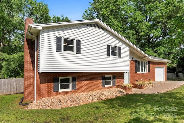1822 N New Hope Rd, Gastonia, NC 28054 - view of home's exterior with a garage, a chimney, and brick siding