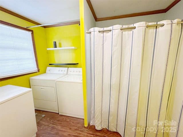 211 Spruce St, Badin, NC 28009 - laundry room with ornamental molding, independent washer and dryer, and wood finished floors