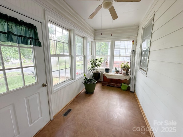 211 Spruce St, Badin, NC 28009 - sunroom / solarium featuring plenty of natural light, baseboards, and wooden walls