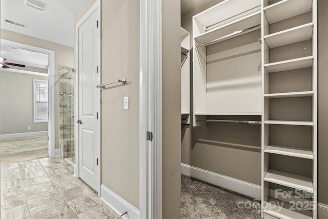 7362 Overjoyed Xing, Charlotte, NC 28215 - walk in closet featuring a ceiling fan