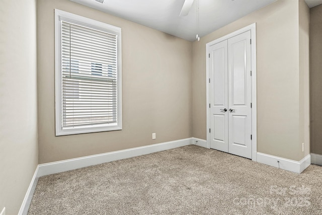 7362 Overjoyed Xing, Charlotte, NC 28215 - unfurnished bedroom featuring carpet, baseboards, and a closet