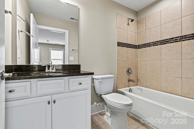 7362 Overjoyed Xing, Charlotte, NC 28215 - bathroom with toilet, vanity, bathtub / shower combination, tile patterned flooring, and baseboards