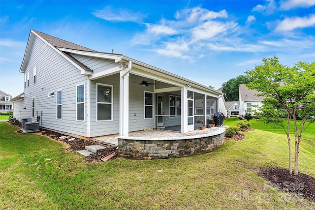 7362 Overjoyed Xing, Charlotte, NC 28215 - back of house with a ceiling fan, a sunroom, a yard, a patio, and central AC
