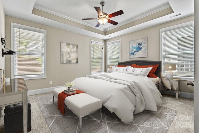 7362 Overjoyed Xing, Charlotte, NC 28215 - bedroom featuring crown molding, a tray ceiling, light colored carpet, baseboards, and ceiling fan