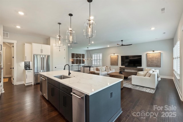 562 Preservation Dr, Fort Mill, SC 29715 - kitchen with a sink, stainless steel appliances, recessed lighting, dark wood-style flooring, and ceiling fan