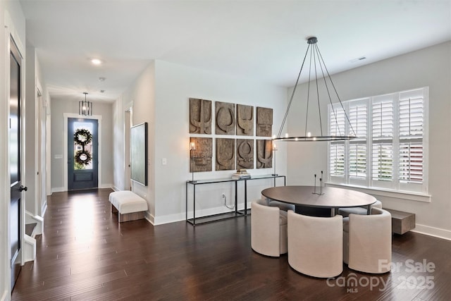 562 Preservation Dr, Fort Mill, SC 29715 - dining area with dark wood-style flooring, baseboards, a chandelier, and recessed lighting