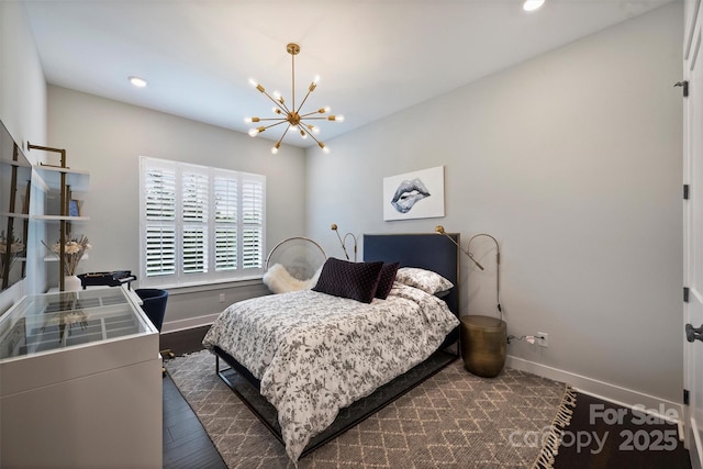 562 Preservation Dr, Fort Mill, SC 29715 - bedroom featuring a chandelier, baseboards, recessed lighting, and dark wood-style flooring