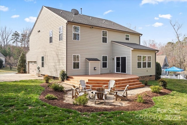 4095 Harmattan Dr, Denver, NC 28037 - back of property with a lawn, crawl space, a garage, a wooden deck, and a patio