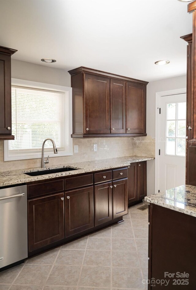 728 Morningside Dr, Mount Holly, NC 28120 - kitchen featuring stainless steel dishwasher, a sink, tasteful backsplash, dark brown cabinetry, and recessed lighting