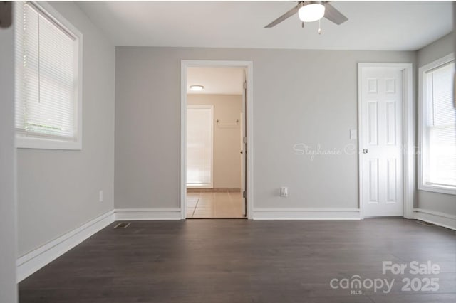 728 Morningside Dr, Mount Holly, NC 28120 - empty room featuring ceiling fan, wood finished floors, and plenty of natural light