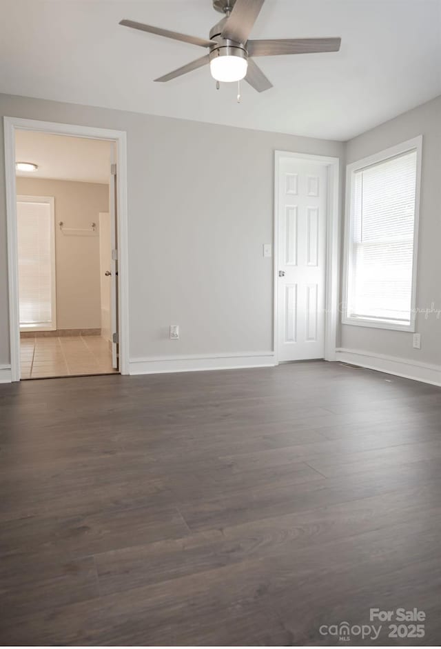 728 Morningside Dr, Mount Holly, NC 28120 - empty room with ceiling fan, wood finished floors, and baseboards