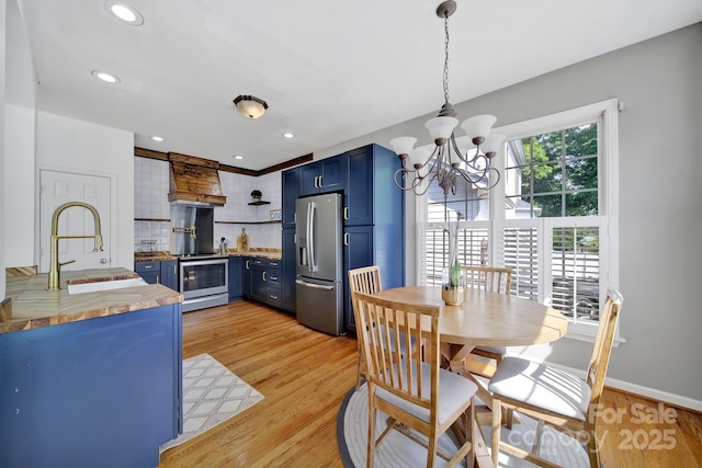 436 Third Baxter St, Fort Mill, SC 29708 - dining space with a chandelier, light wood-type flooring, baseboards, and recessed lighting