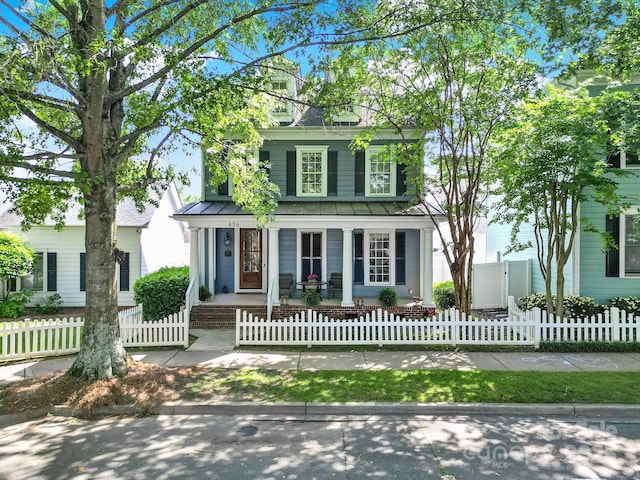 436 Third Baxter St, Fort Mill, SC 29708 - american foursquare style home with a porch, a standing seam roof, metal roof, and a fenced front yard