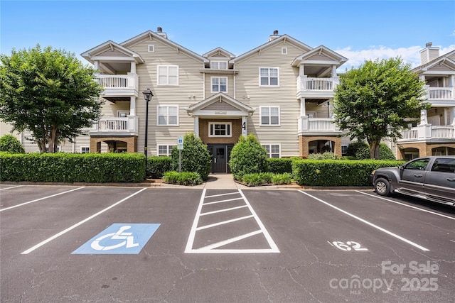 17111 Doe Valley Ct, Cornelius, NC 28031 - view of building exterior with uncovered parking