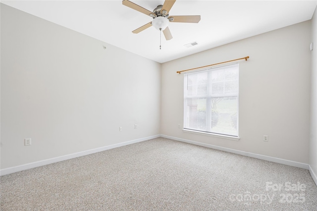 17111 Doe Valley Ct, Cornelius, NC 28031 - spare room featuring carpet, baseboards, and a ceiling fan