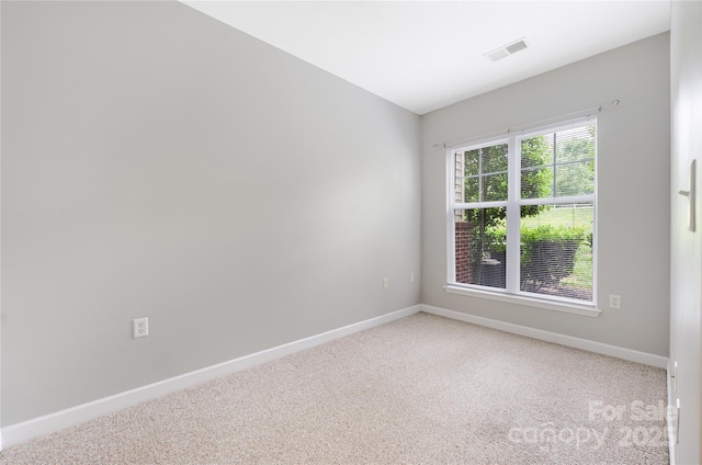 17111 Doe Valley Ct, Cornelius, NC 28031 - unfurnished room with baseboards and light colored carpet